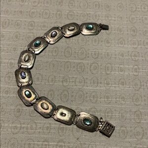 Holly Yashi Sterling Silver and gemstone bracelet with. Missing one stone!